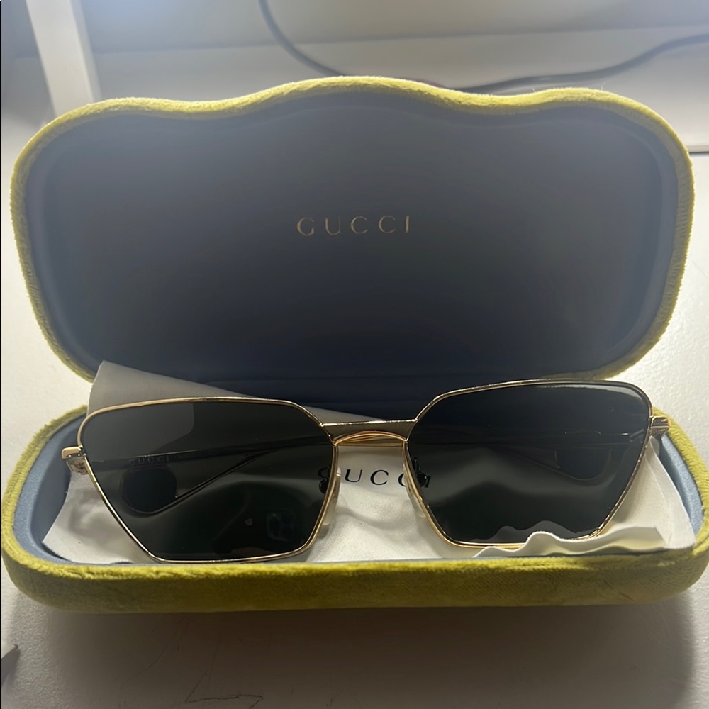 Gucci Black and Gold Sunglasses